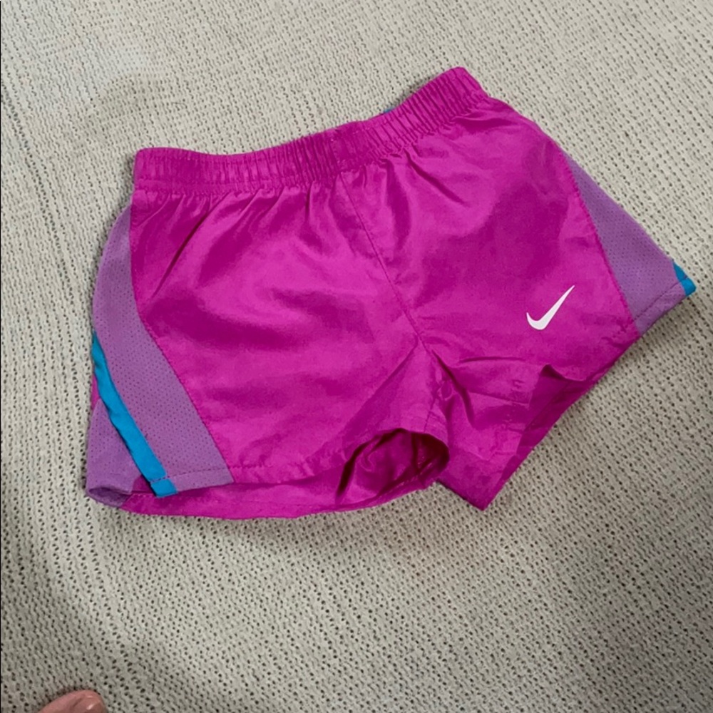 Purple Nike shorts